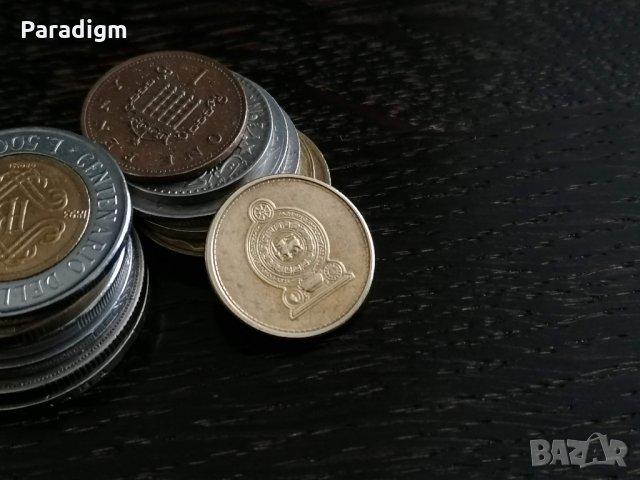 Mонета - Шри Ланка - 1 рупия | 2009г., снимка 2 - Нумизматика и бонистика - 31456921