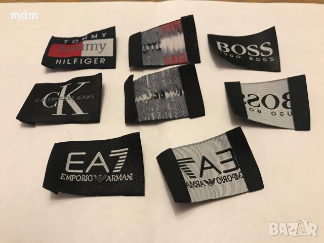 тъкан етикет на марката calvin, tommy, boss, armani