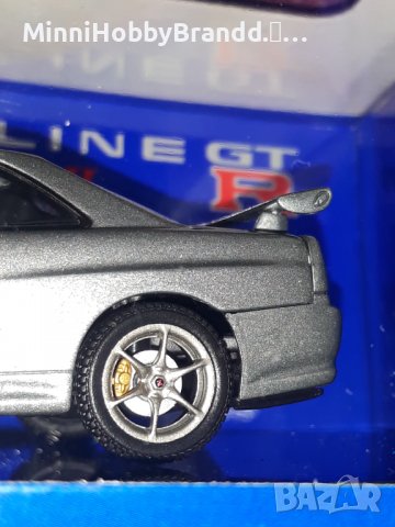 NISSAN  SKYLINE GT-R R 34 V spec AUTOart 1.43  Top Model , снимка 17 - Колекции - 39258739