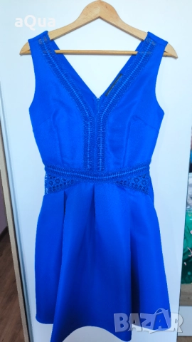 Елегантни дамски рокли 