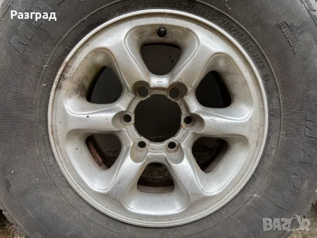 Алуминиеви джанти с гуми 15 цола за джип Mitsubishi Pajero, снимка 10 - Гуми и джанти - 47952677