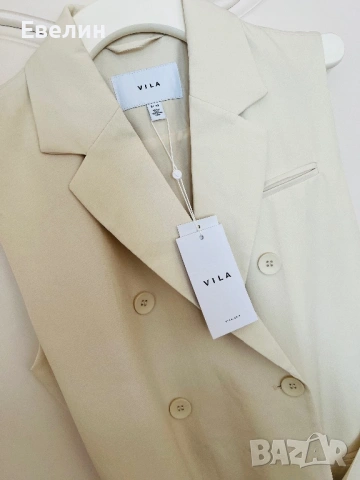 Бял елек vila