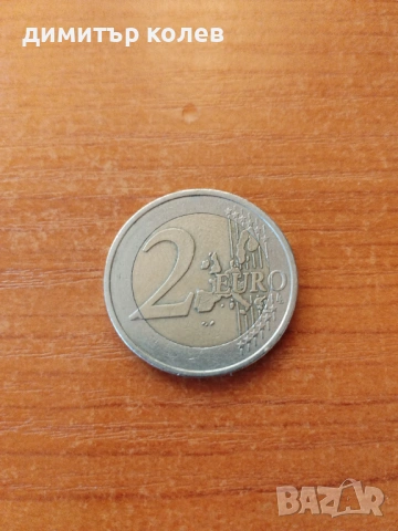 евро монета