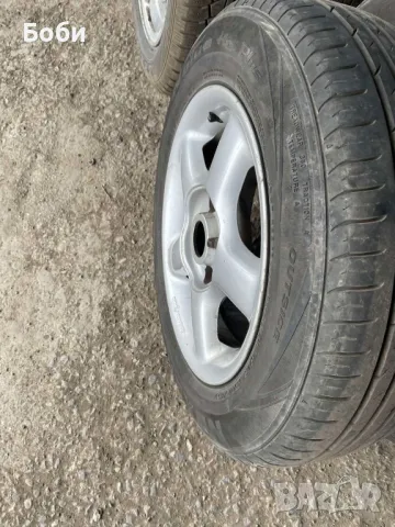 Два комплекта джанти с летни/зимни гуми // Honda 14" 4x100mm, снимка 2 - Гуми и джанти - 49563747