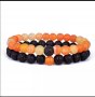 Комплект от две гривни от лава и естествени камъни оранжево черно