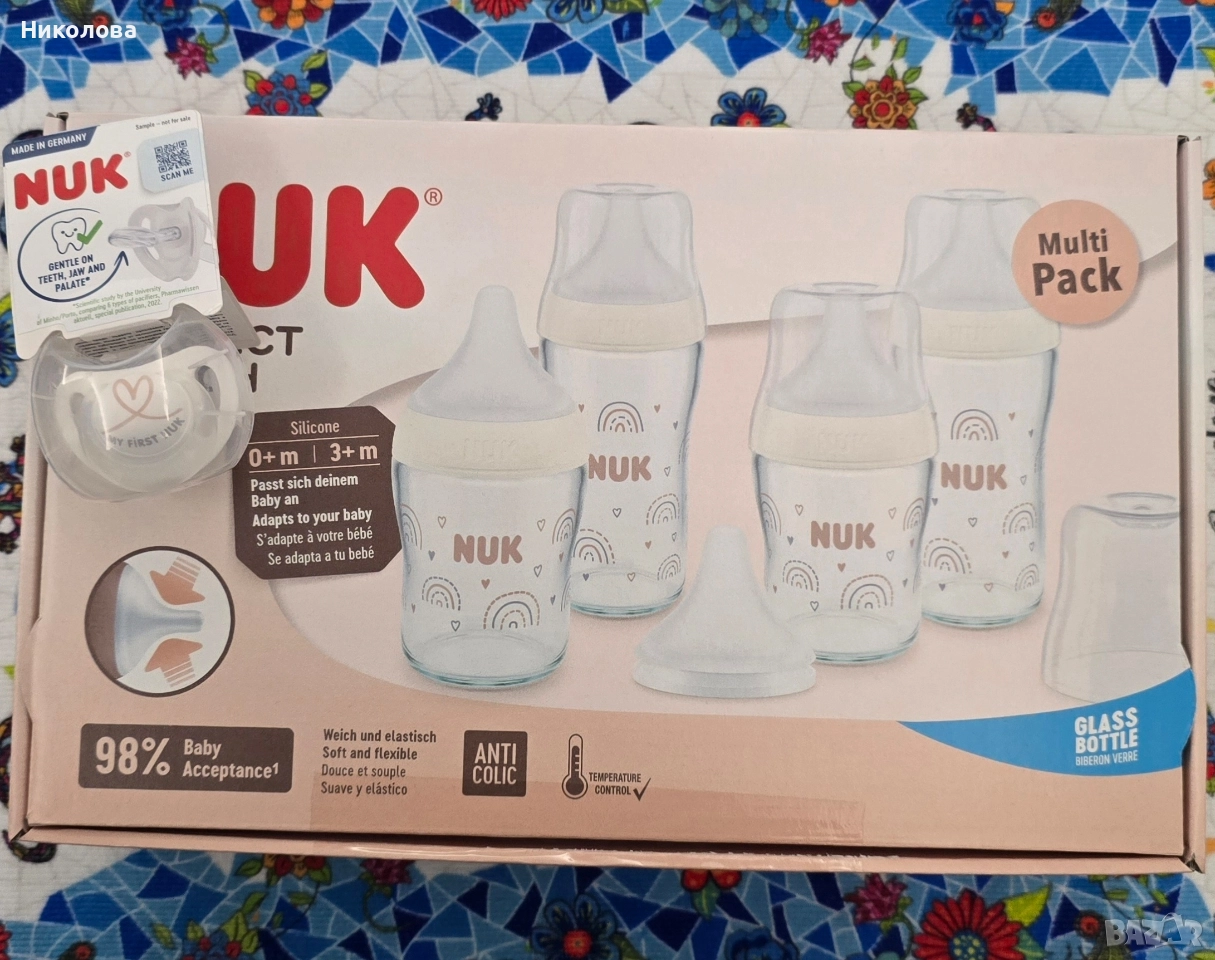 Комплект шишета та NUK + залагалка , снимка 1