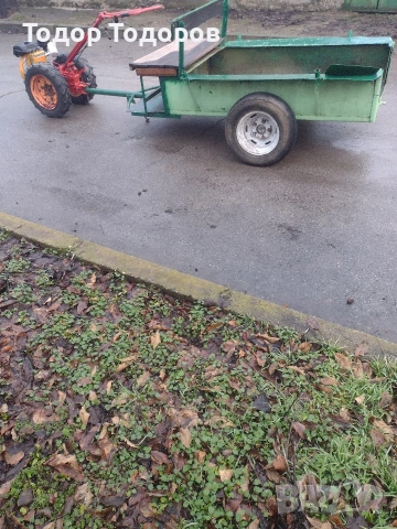 Мотоблок, мотофреза или мотокултиватор акме след основно сервизиране с ремарке.