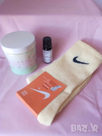 Промо комплект 927-масло за тяло Luzy one,етер.масло лимон и чорапи Nike