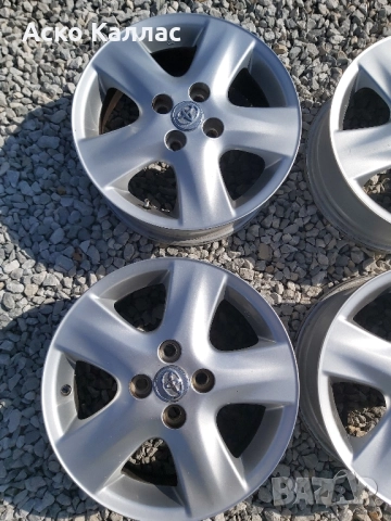 4x100..15.цола..5.5j ET45 оргинални Toyota, снимка 2 - Гуми и джанти - 51830978