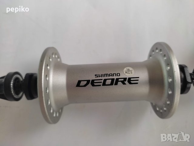 Продавам колела внос от Германия предна главина SHIMANO DEORE HB-M590 , снимка 2 - Части за велосипеди - 38141166