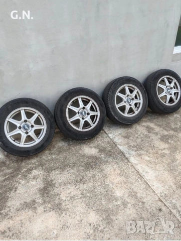 Джанти с гуми 4х114.3 14