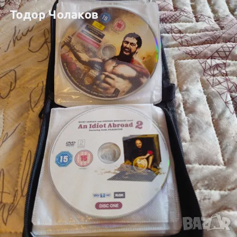 Албум от 31 двд филма.

, снимка 13 - DVD филми - 47841257