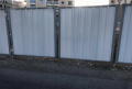 Плътна строителна ограда под наем