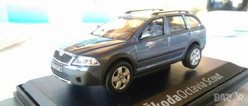 Skoda Octavia Combi Scout - мащаб 1:43 на Abrex моделът е нов в PVC дисплей-кейс, снимка 1