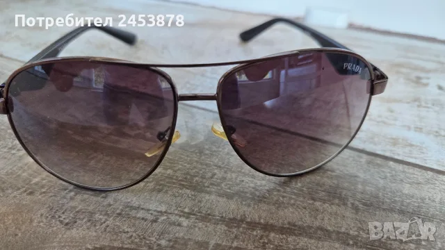 Слънчеви очила Prada, снимка 9 - Слънчеви и диоптрични очила - 56393336
