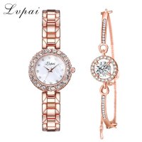 Дамски часовник с кристали + Подарък гривна., снимка 1 - Бижутерийни комплекти - 29480346
