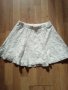 Бяла дантелена пола , снимка 1 - Детски рокли и поли - 40326011