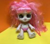Детска кукла с големи очи и розова коса