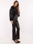Дамски черен панталон от еко кожа с декоративни презрамки, снимка 5
