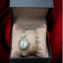 Красив подаръчен комплект часовник с гривна в нежен дизайн с камъни цирконии 