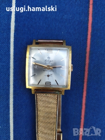 Позлатен швейцарски часовник