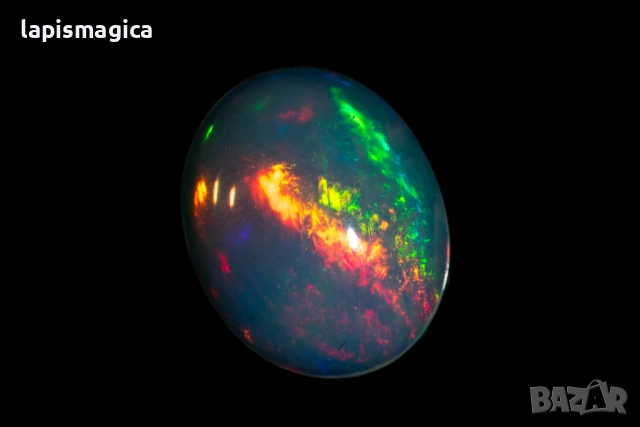 Етиопски опал 0.82ct 9x7mm овален кабошон, снимка 3 - Други - 52135226