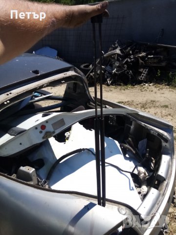 Амортесьори заден капак Опел тигра 1998г