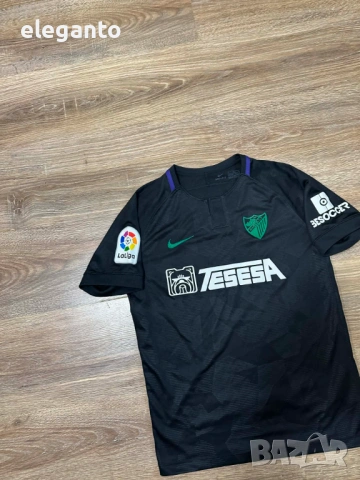 Оригинална Юношеска футболна тениска Nike Malaga CF 2018 2019  Away/Гостуваща , 158/170 размер , снимка 3 - Футбол - 53996508