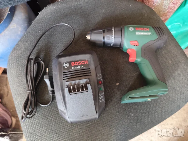 чисто нов винтоверт Bosch 18V с ново зарядно Bosch AL 1830 CV