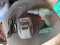 чисто нов винтоверт Bosch 18V с ново зарядно Bosch AL 1830 CV, снимка 1