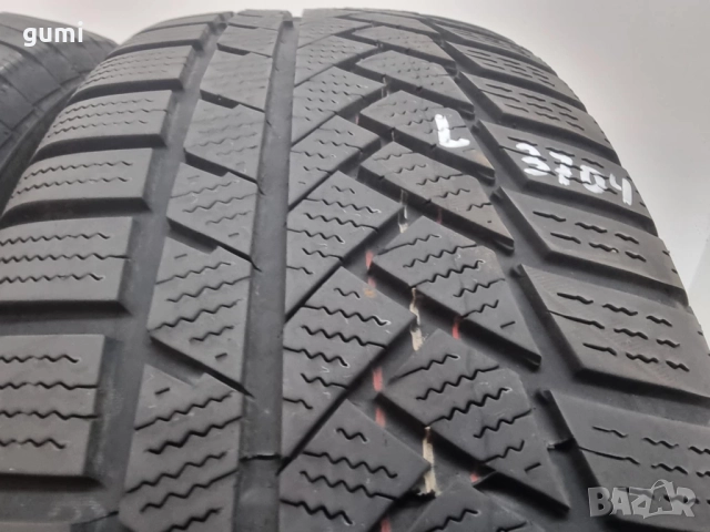 2бр зимни гуми 215/60/18 CONTINENTAL L03704 , снимка 2 - Гуми и джанти - 51443476
