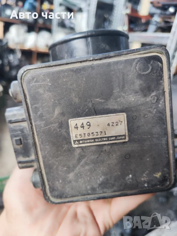 Дебитомер за Mitsubishi Colt 1.6 E5T05371, снимка 2 - Части - 50797722