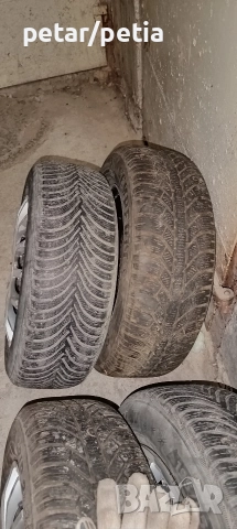 Зимни гуми със джанти Opel Astra 195/65/15, снимка 4 - Гуми и джанти - 52592861