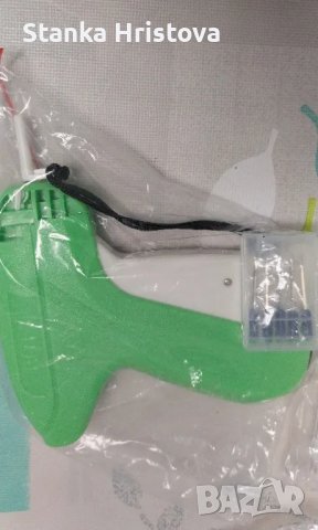 Пистолет за етикиране .