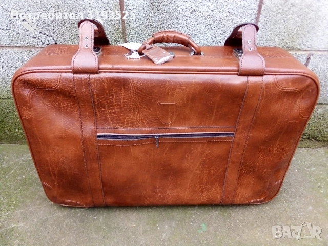 Пътнически куфар с колелца