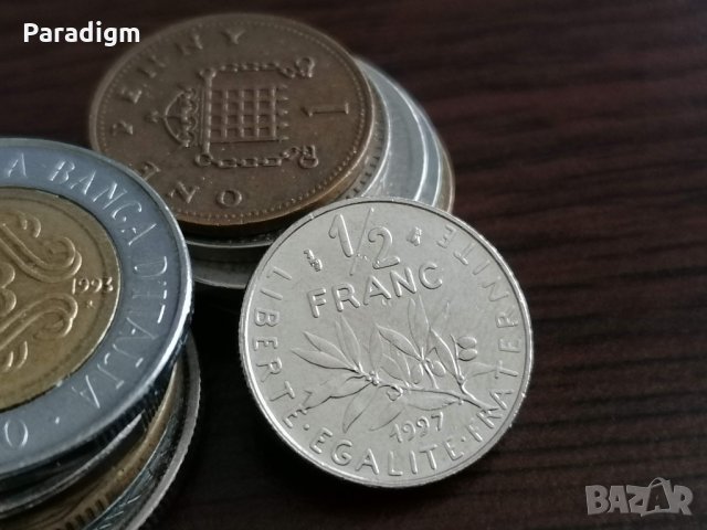 Монета - Франция - 1/2 (половин) франк | 1997г.