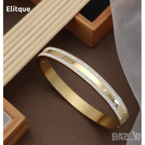 Твърда дамска гривна с камъни цирконии в изискан дизайн