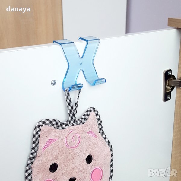 1695 Пластмасова прозрачна закачалка за вратичка с форма X, снимка 1