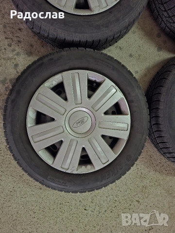 Железни джанти 14" Форд с зимни гуми, снимка 11 - Гуми и джанти - 54025741