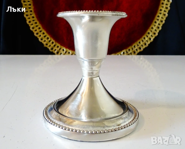 Посребрен свещник 7 см.,перлен релеф. 