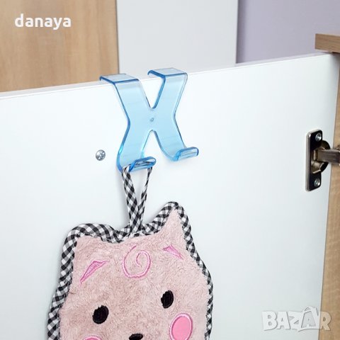 1695 Пластмасова прозрачна закачалка за вратичка с форма X