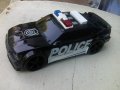 Умален пластмасов модел на полицейска кола с батерия свири и с инерционен механизъм, снимка 1