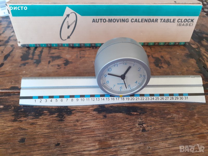 часовник антикварен движещ се по релса сам и показващ дата, супер ефектно, снимка 1