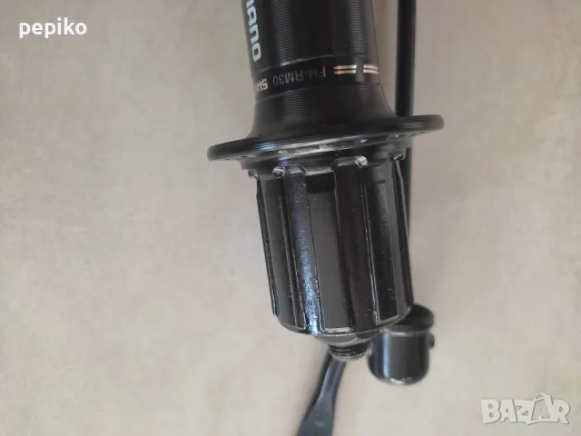 Продавам колела внос от Германия НОВА алуминиева главина SHIMANO FH-RM 30, снимка 4 - Части за велосипеди - 55873826