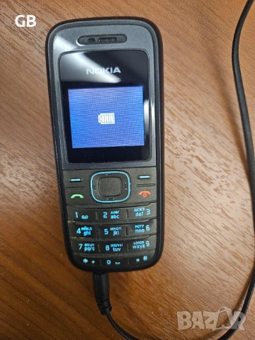 Nokia 1208 с оригинално зарядно + кожено калъфче, снимка 8 - Nokia - 50212205