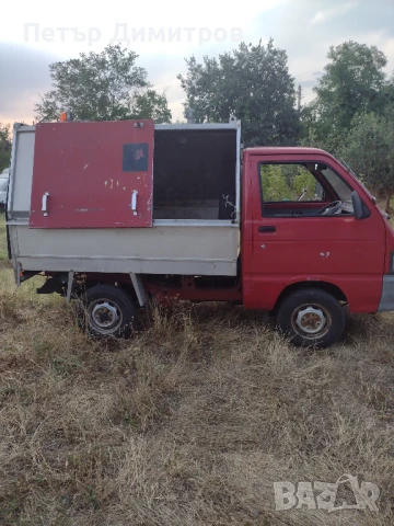 Малък самосвален камион Дайхацу.