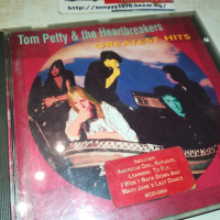 TOM PETTY & THE HEARTBREAKERS CD 0803241024, снимка 10 - CD дискове - 44665913