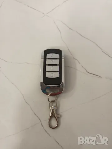 УНИВЕРСАЛНО Дистанционно управление с 4 кода 315MHz,390MHz,433MHZ,868MHz гаражна врата,бариера, снимка 2 - Аксесоари и консумативи - 48253878