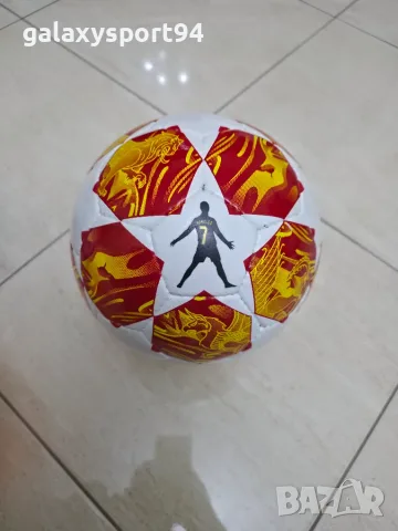 Топка Роналдо червено-оранжева с фигура Шампионска лига 2027 Cristiano Ronaldo