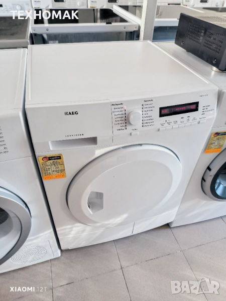 Сушилня AEG клас А++ инверторен мотор, термопомпа 7кг. , снимка 1